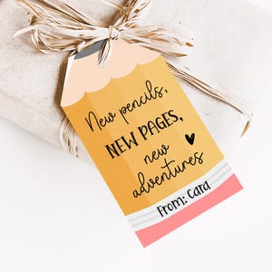 a gift wrapped in brown paper with a tag on it