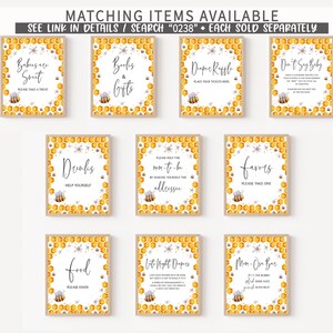 May include: A set of ten printable signs with a bee and honeycomb theme. The signs include titles such as "Babies are Sweet", "Books & Gifts", "Drinks", "Food", "Favors", "Don't Say Baby", "Diaper Raffle", "Mom-to-be", "Let's Light Diapers", and "Mom-to-be Bar".