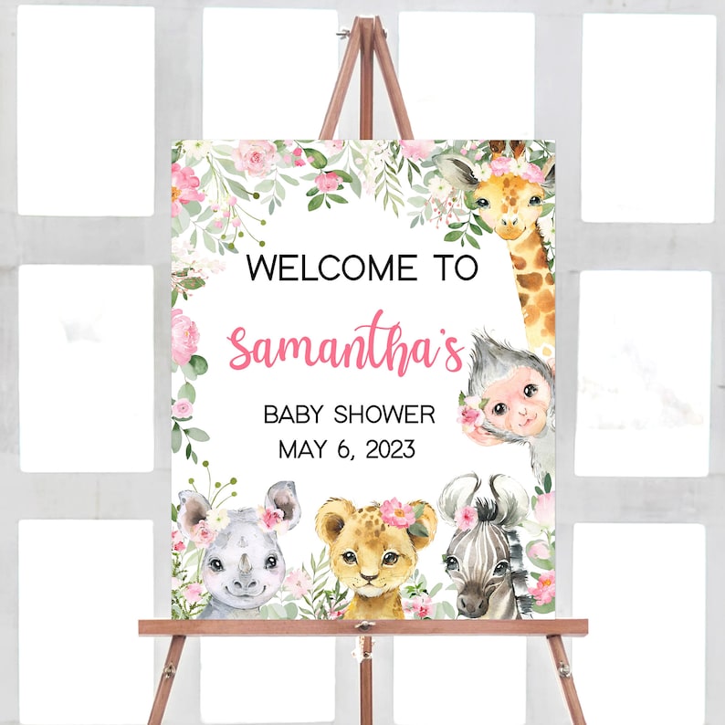 May include: Welcome to Samantha's Baby Shower on May 6, 2023. A pink and green floral welcome sign with a giraffe, monkey, rhino, lion, and zebra.