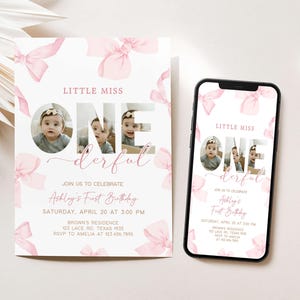 a baby girl's first birthday party with a phone
