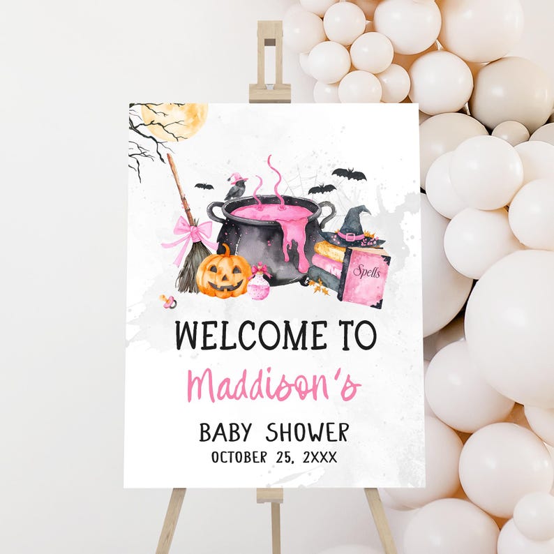 a sign with a Halloween theme, including a witch's broom, a pumpkin, and a cauldron, along with the text "Welcome to Maddison's Baby Shower" and the date "October 25, 2XXX".