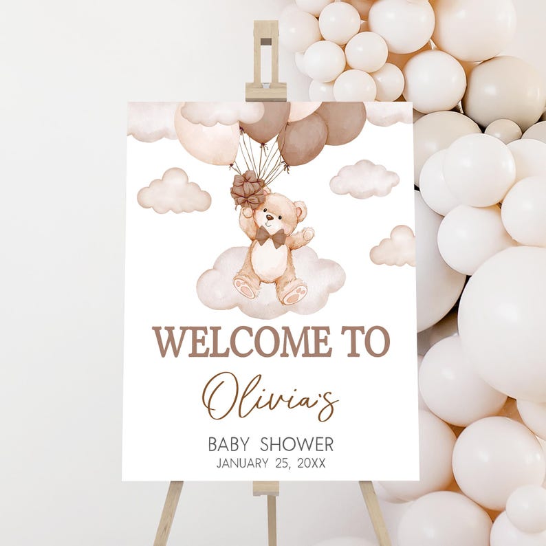 a welcome sign for a baby shower with balloons
