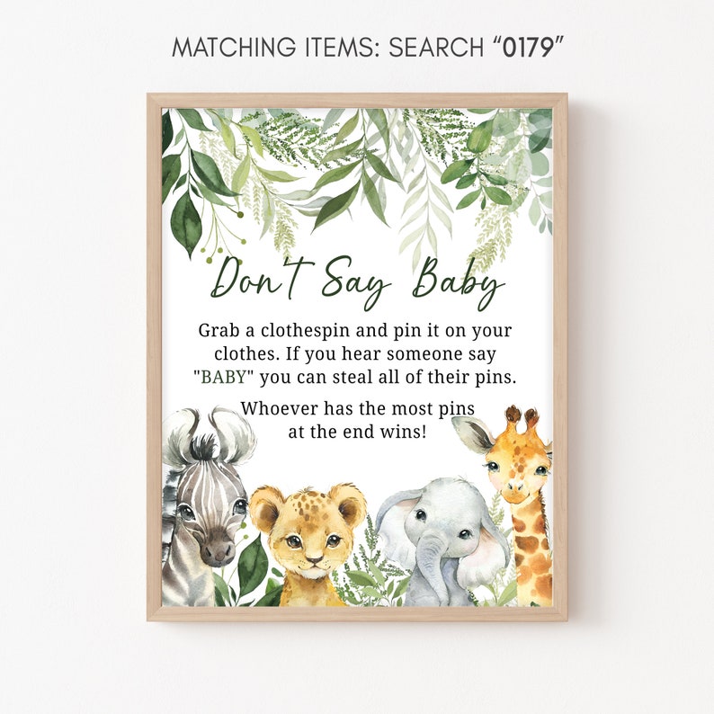 May include: A printable game card with a green leafy border and a watercolor illustration of a zebra, lion, elephant, and giraffe. The card says "Don't Say Baby" and includes instructions for a game where guests try to avoid saying the word "baby".