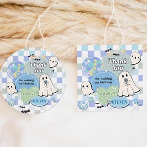 a couple of tags that are on a bed