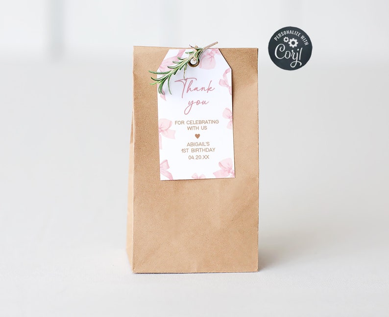 a brown paper bag with a thank you tag on it