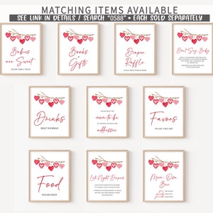 May include: Printable signs for a baby shower with a red and white gingham heart theme. The signs include "Babies are Sweet", "Books & Gifts", "Diaper Raffle", "Don't Say Baby", "Drinks", "Please Greet the Mom-to-be", "Favors", "Food", "Late Night Diapers", and "Mom-Osa Bar".