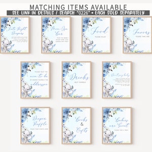 K&ouml;nnte beinhalten: Zehn druckbare Schilder f&uuml;r eine Babyparty mit einem blauen und wei&szlig;en Elefanten-Motiv. Die Schilder beinhalten "Late Night Diapers", "Mom-osa Bar", "Food", "Favors", "Please Help the Mom-to-be Address", "Drinks", "Don't Say Baby", "Diaper Raffle", "Books & Gifts", and "Babies are Sweet".