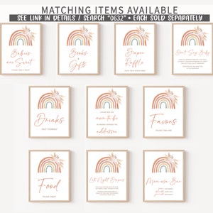 May include: Set of ten printable signs with a rainbow and floral design. The signs include text such as "Babies are Sweet", "Books & Gifts", "Drinks", "Food", "Late Night Diapers", "Mom-osa Bar", "Don't Say Baby", "Draper Raffle", "Favors", and "Please Help the Mom-to-be by Making Yourself the Addressee".