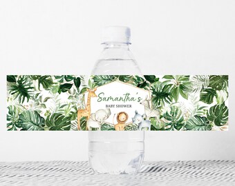 May include: Water bottle label with a jungle theme. The label features green leaves, a giraffe, an elephant, a lion, a rhinoceros, and a zebra. The text on the label reads "Samantha's Baby Shower".