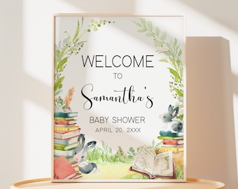 May include: Welcome to Samantha's Baby Shower sign with a watercolor illustration of a stack of books, two bunnies, and greenery. The text reads "Welcome to Samantha's Baby Shower April 20, XXXX".