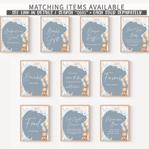 Peut inclure: Dix pancartes imprimables pour une f&ecirc;te pr&eacute;natale avec un th&egrave;me bleu et marron. Les pancartes repr&eacute;sentent un ours en peluche et des ballons et comportent des textes tels que "Livres et cadeaux", "Boissons", "Nourriture", "Faveurs", "Bar &agrave; mimosa", "Ne dites pas b&eacute;b&eacute;", "Couches de nuit", "Veuillez aider la future maman", "Les b&eacute;b&eacute;s sont doux", et "Tombola de couches".