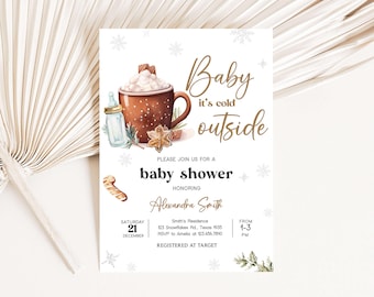 May include: A winter-themed baby shower invitation with a watercolor illustration of a mug of hot chocolate, a baby bottle, and a gingerbread cookie. The text reads "Baby it's cold outside" and invites guests to a shower honoring Alexandra Smith.