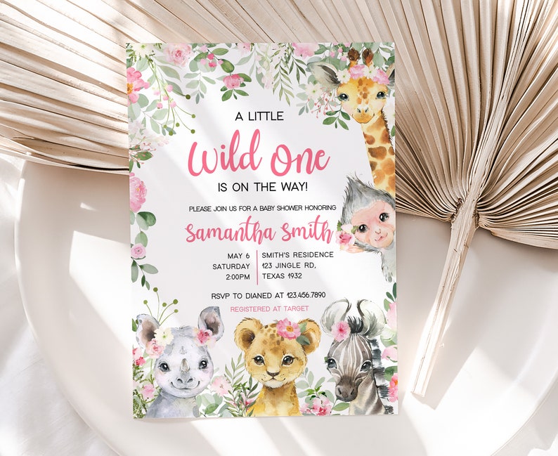 May include: A pink and green baby shower invitation with a floral border and a watercolour illustration of a giraffe, monkey, rhino, lion, and zebra. The text reads "A Little Wild One Is On The Way!" and includes the name "Samantha Smith" and details for the baby shower.