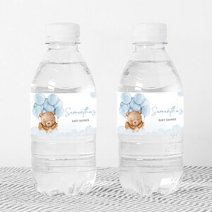 a couple of water bottles sitting on top of a table