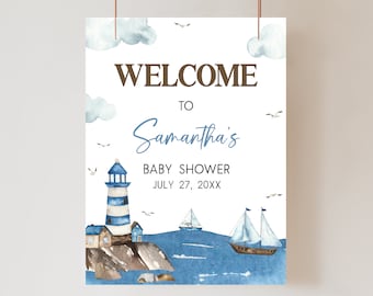 May include: A baby shower welcome sign with a nautical theme. The sign depicts a lighthouse, sailboats, and seagulls over a watercolor ocean scene. The text reads "WELCOME TO Samantha's BABY SHOWER JULY 27, 20XX" in brown and blue fonts.