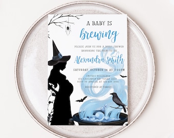 May include: A baby shower invitation with a Halloween theme. The invitation features a silhouette of a pregnant witch, a cauldron with blue smoke, bats, and the text "A Baby is Brewing". The invitation is on a white background.