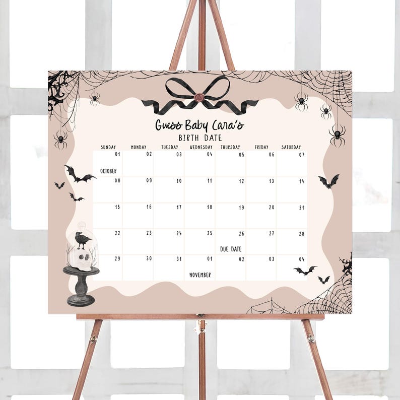 a calendar on a easel with a bow on it