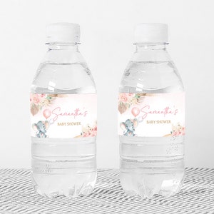 a couple of water bottles sitting on top of a table