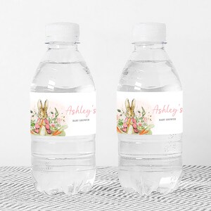 two bottles of water with labels on them