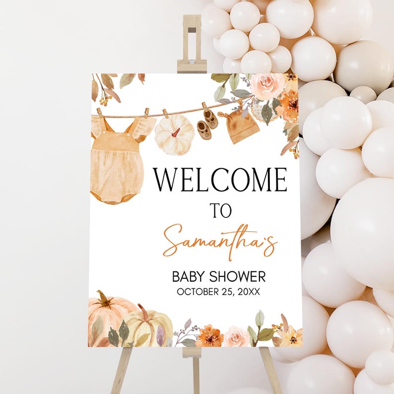 a welcome sign with balloons surrounding it