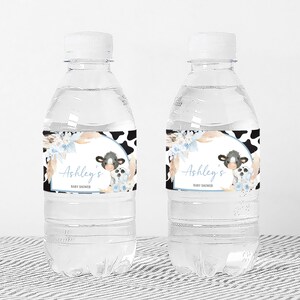 a couple of water bottles sitting on top of a table