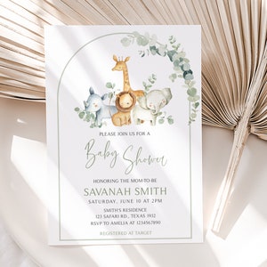 May include: A baby shower invitation with a green and white border. The invitation features a watercolor illustration of a giraffe, lion, elephant, and rhinoceros. The text on the invitation reads "Please join us for a Baby Shower honoring the mom-to-be Savannah Smith, Saturday, June 10 at 2pm, Smith's Residence, 123 Safari Rd., Texas 1932, RSVP to Amelia at 1234567890, Registered at Target."