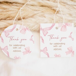a couple of tags that are on a bed