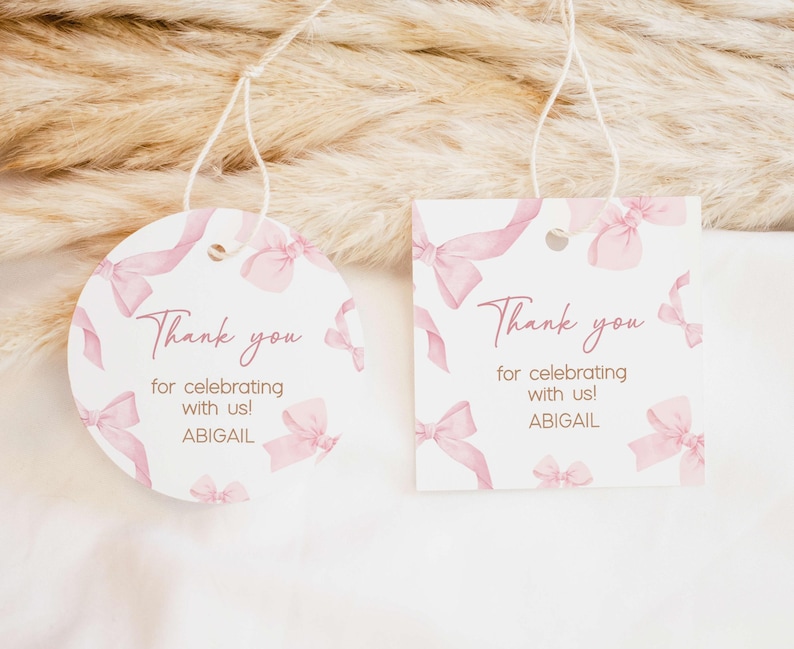 a couple of tags that are on a bed