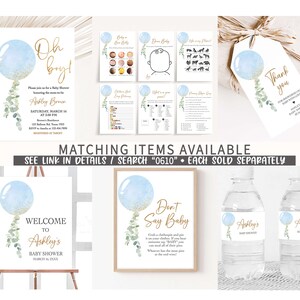 Puede incluir: Decoraciones para baby shower azul y dorado con tem&aacute;tica de globos. Las decoraciones incluyen un letrero de bienvenida, invitaciones, etiquetas para botellas de agua y un juego de "no digas beb&eacute;". El texto en las invitaciones dice "&iexcl;Oh, ni&ntilde;o!" y "Ashley Brown".