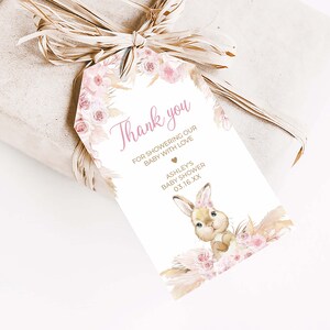 a gift wrapped in brown paper and tied with a ribbon