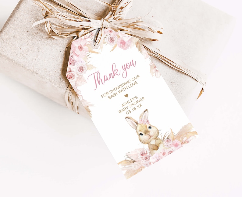 a gift wrapped in brown paper and tied with a ribbon