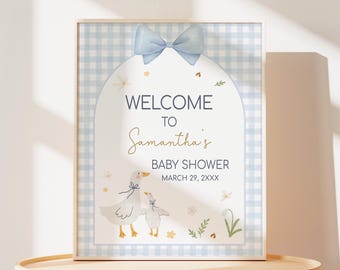 May include: A blue and white gingham welcome sign with a blue bow, two white geese, and the text "Welcome to Samantha's Baby Shower March 29, 2XXX".