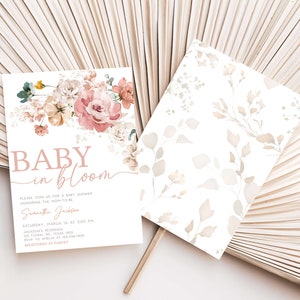 a close up of a fan with a baby in bloom card
