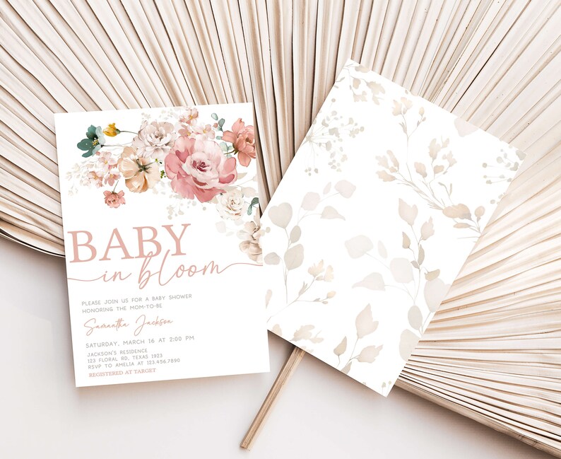 a close up of a fan with a baby in bloom card