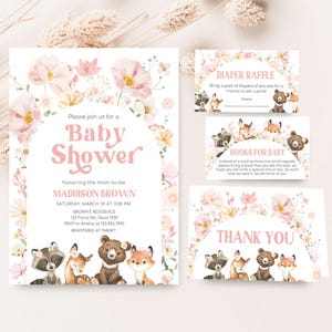 a baby shower is shown with a bear and flowers