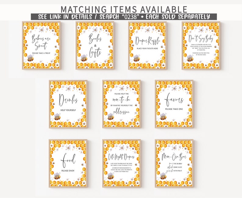May include: A set of ten printable signs with a bee and honeycomb theme. The signs include titles such as "Babies are Sweet", "Books & Gifts", "Drinks", "Food", "Favors", "Don't Say Baby", "Diaper Raffle", "Mom-to-be", "Let's Light Diapers", and "Mom-to-be Bar".