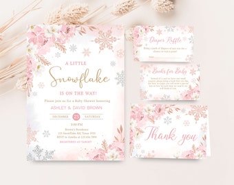 Puede incluir: Un conjunto de invitaciones y tarjetas para baby shower con temática de copo de nieve. La invitación principal es rosa y blanca con detalles florales y de copos de nieve, y el texto "A Little Snowflake is on the Way!". Incluye tarjetas adicionales.