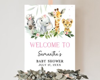 May include: Welcome to Samantha's Baby Shower sign with a pink and white floral design. The sign features a zebra, elephant, giraffe, and lion with pink flowers. The text reads "Welcome to Samantha's Baby Shower July 27, 2XXX".
