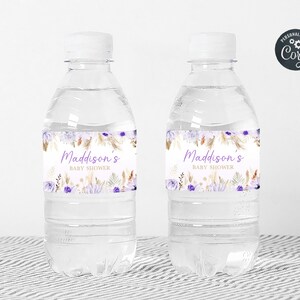 May include: Two clear plastic water bottles with purple and gold floral labels that say "Maddison's Baby Shower".
