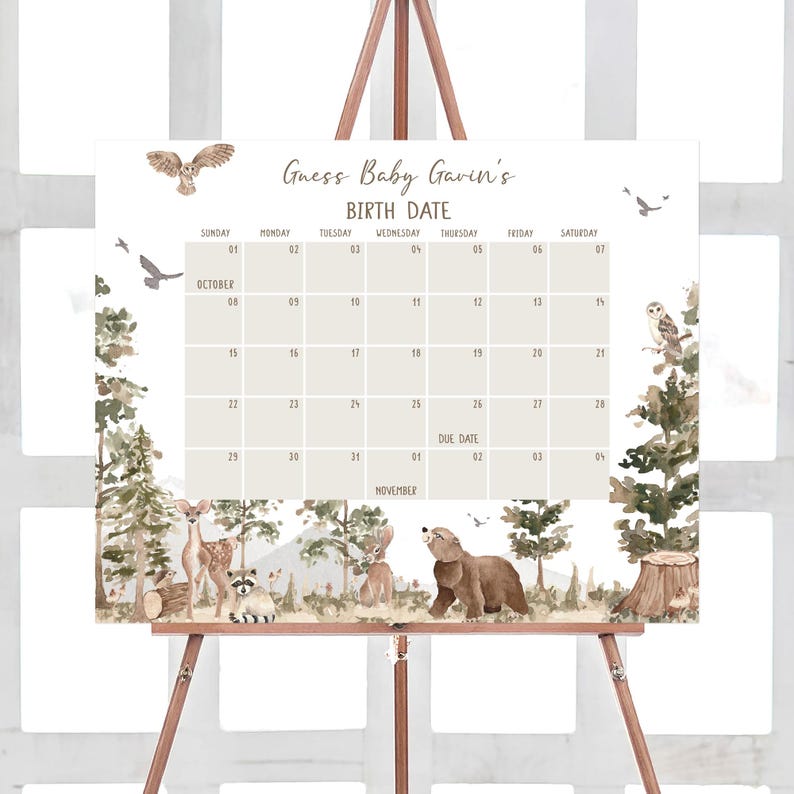 a wooden easer with a baby shower calendar on it