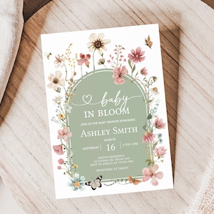 a baby is in bloom card on a table