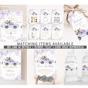 May include: A collection of baby shower stationery featuring a light purple truck carrying a Christmas tree and woodland animals, decorated with snowflakes and floral accents. Includes invitations, game cards, thank you tags, and water bottle labels.