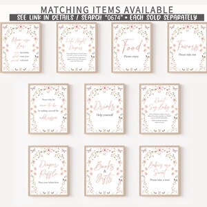 May include: A set of 10 printable signs for a baby shower. The signs are decorated with pink flowers and butterflies. The signs include: Mama-to-be Bar, Life Night Diapers, Food, Favors, Please help the mom-to-be by making yourself the addressee, Drinks, Don't Say Baby, Diaper Raffle, Books & Gifts, Babies are Sweet.