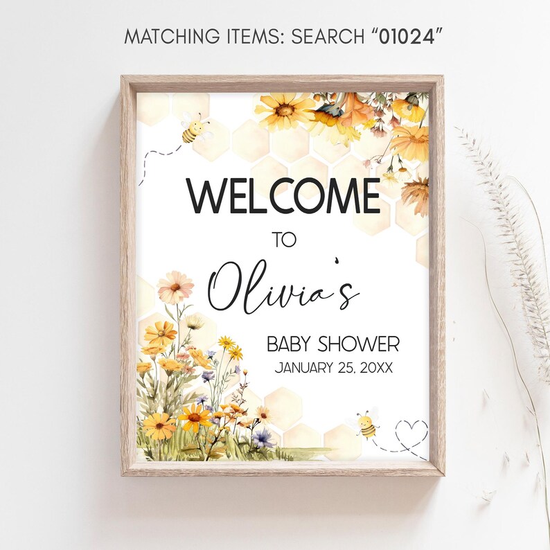 a picture of a baby shower sign hanging on a wall
