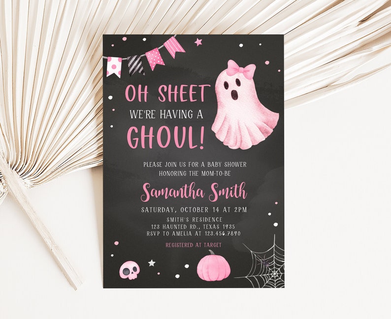 May include: A Halloween-themed baby shower invitation with a black chalkboard background. The invitation features pink text that reads "Oh Sheet We're Having a Ghoul!" and includes a pink ghost illustration. Additional details include the mom-to-be's name, date, time, and location.