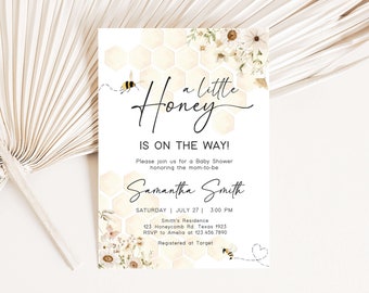 May include: A baby shower invitation with a honeycomb pattern and floral accents. The text reads "a little honey is on the way!" and includes the name "Samantha Smith".