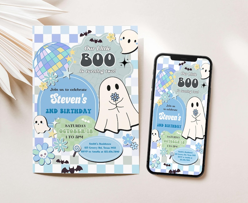 a phone and a birthday card on a table