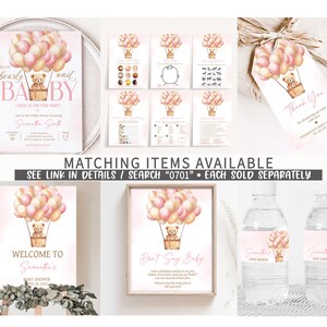 Pode incluir: Um conjunto de decora&ccedil;&otilde;es imprim&iacute;veis para um ch&aacute; de beb&ecirc; com um urso de pel&uacute;cia em um bal&atilde;o de ar quente com bal&otilde;es rosa e brancos. O texto "We can barely wait BABY" est&aacute; no convite. O conjunto inclui uma placa de boas-vindas, uma placa de "n&atilde;o diga beb&ecirc;", etiquetas para garrafas de &aacute;gua e uma etiqueta de agradecimento.