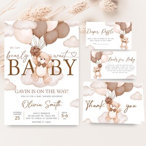 a baby shower with a teddy bear on it