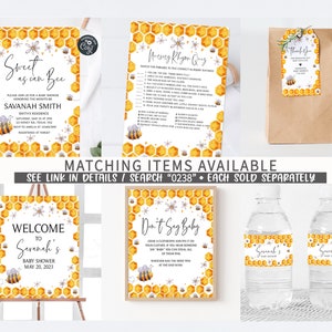 May include: A set of printable baby shower decorations featuring a bee and honeycomb design. The set includes a welcome sign, a don't say baby game, a water bottle label, a thank you tag, and a baby shower invitation. The decorations are yellow, white, and grey.
